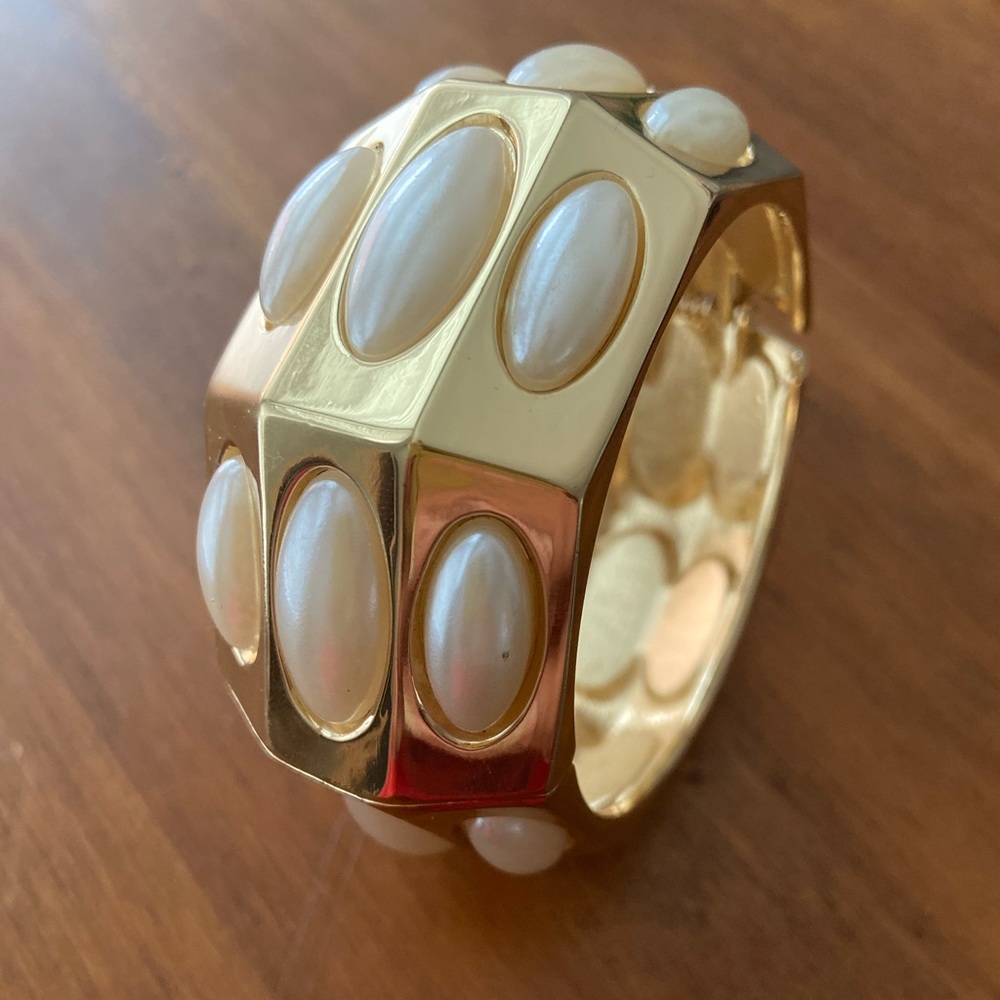 Gold tone and pearl bracelet bangle